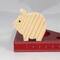 Handmade wooden pig toy, sustainable wood, scroll saw cut, sanded smooth. 1.75", 2", or 2.5" sizes, natural finish for stacking or play.